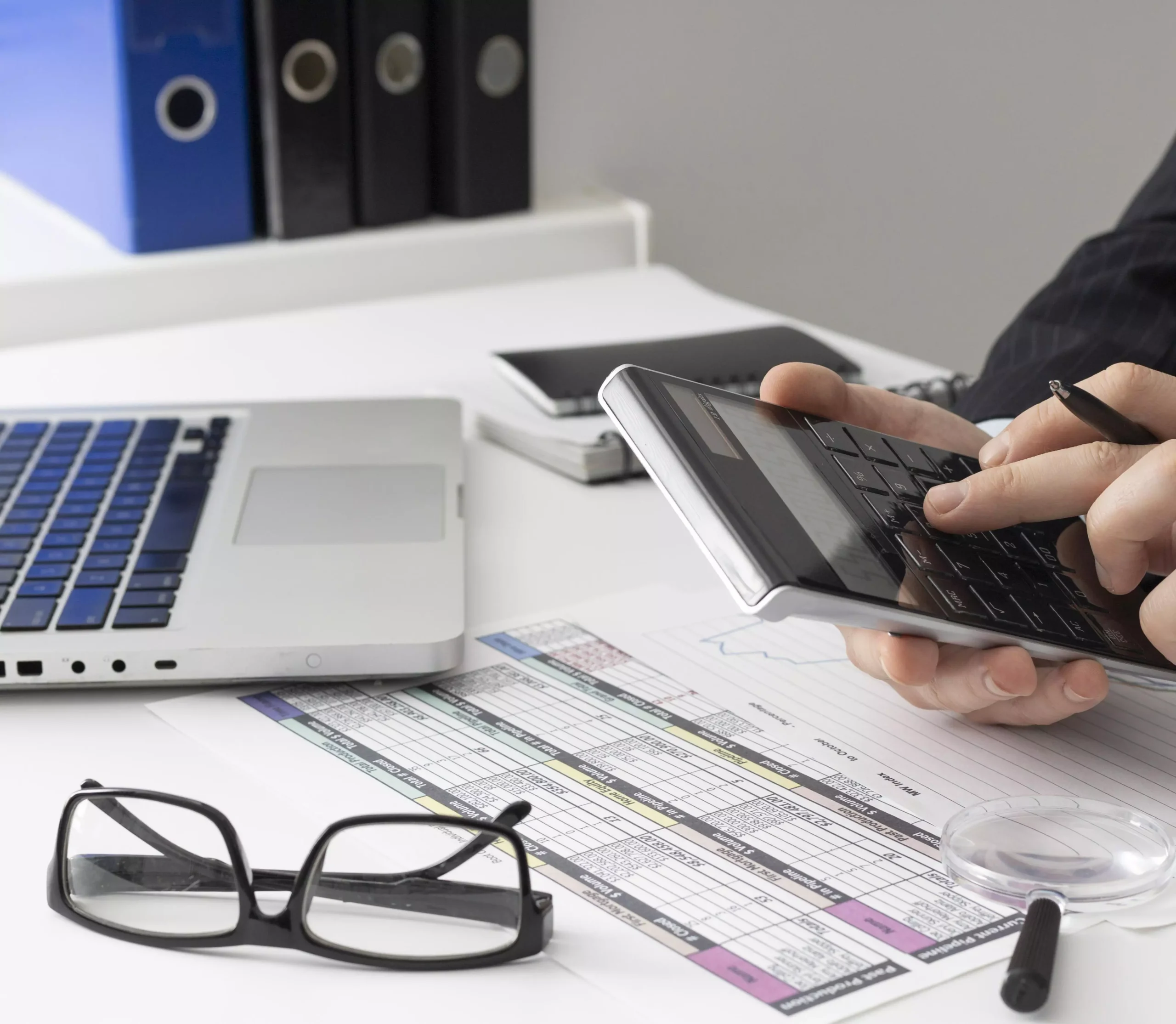 Accountant calculating business finances in Dubai office.